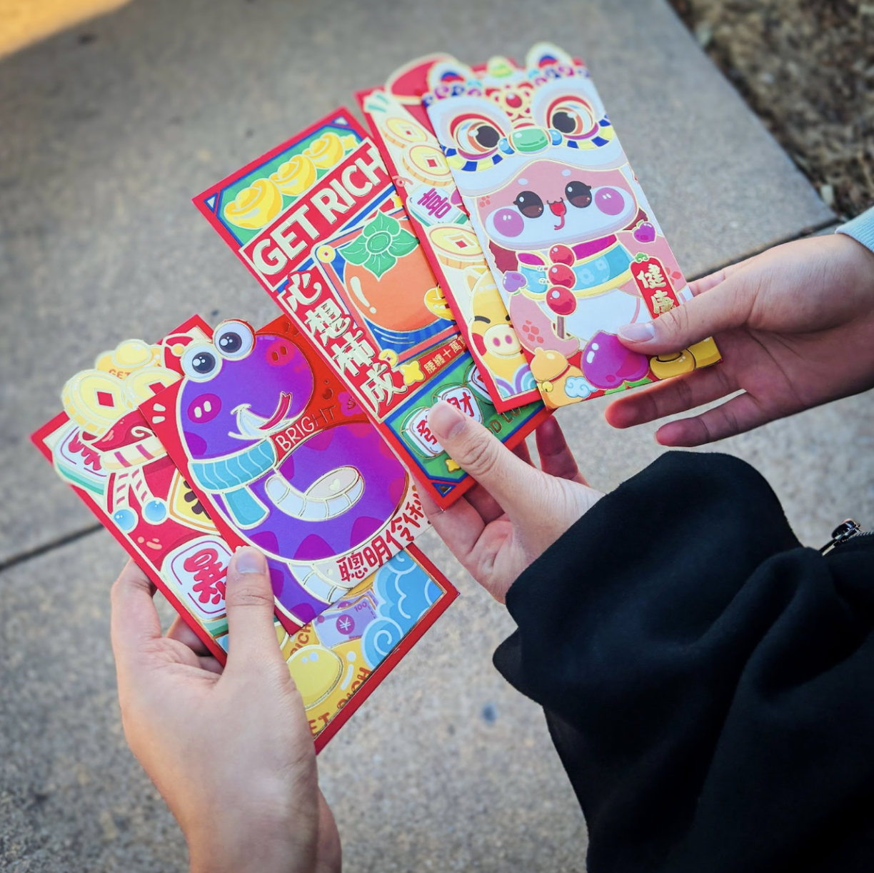 Lunar New Year tradition: Red envelopes with money. 